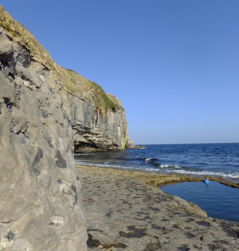 The manmade swimming pool, blasted out of the rocks at Dancing Ledge on the South West Coast Path, Isle of Purbeck, Dorset