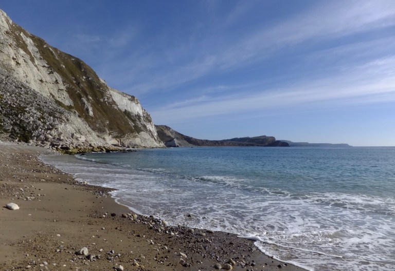 The beach at Mupe Bay, between Lulworth Cove and Worbarrow Bay, on the South West Coast Path, Dorset, UK