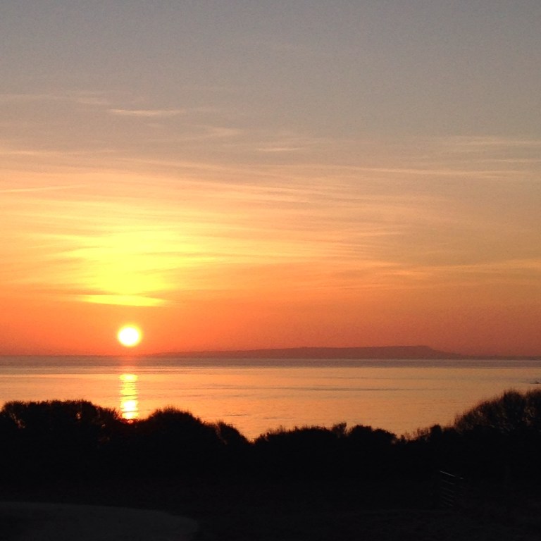 Sunset over the Isle of Portland as seen from Kimmeridge