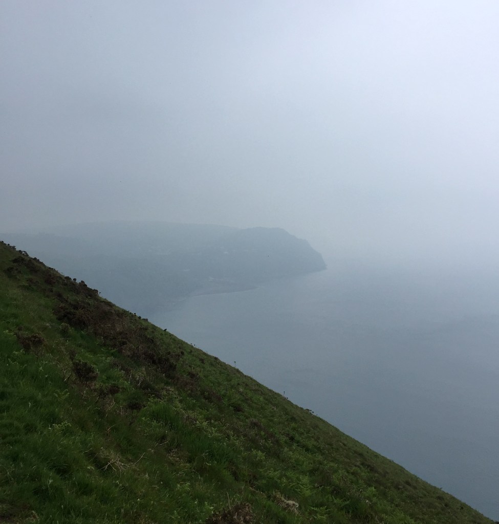 A misty view of Lynmouth, taken from the South West Coast Path near Countisbury